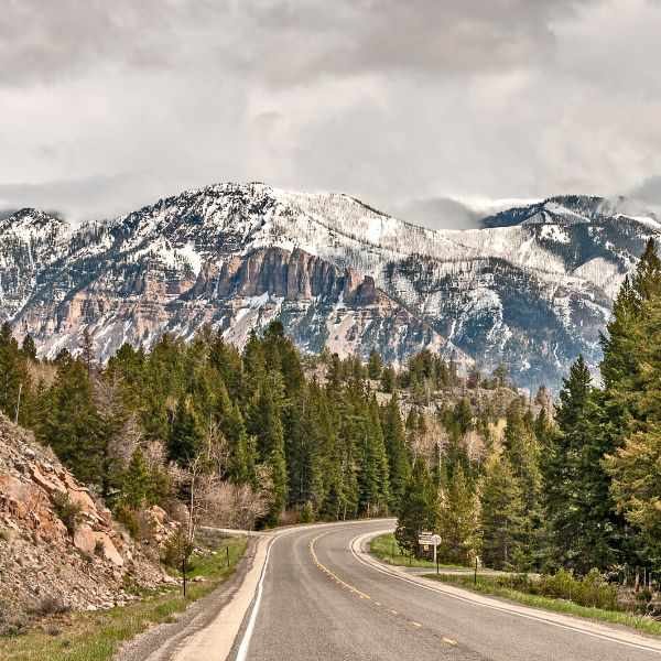 Wyoming snow-capped mountains highway